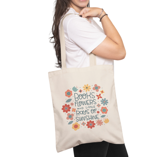 Books , flowers and rays of sunshine tote bag