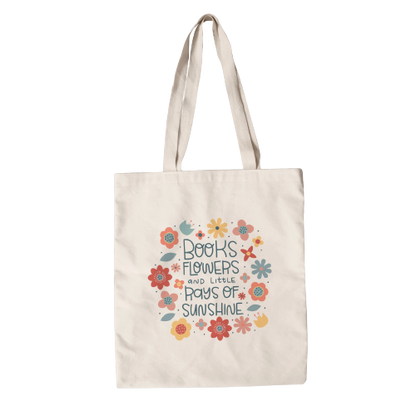 Books , flowers and rays of sunshine tote bag